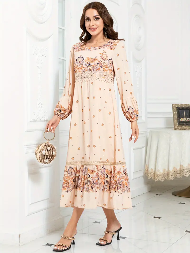 فستان ميدي بأكمام منتفخة مستوحى من الطراز القديم لربيع وصيف 2025