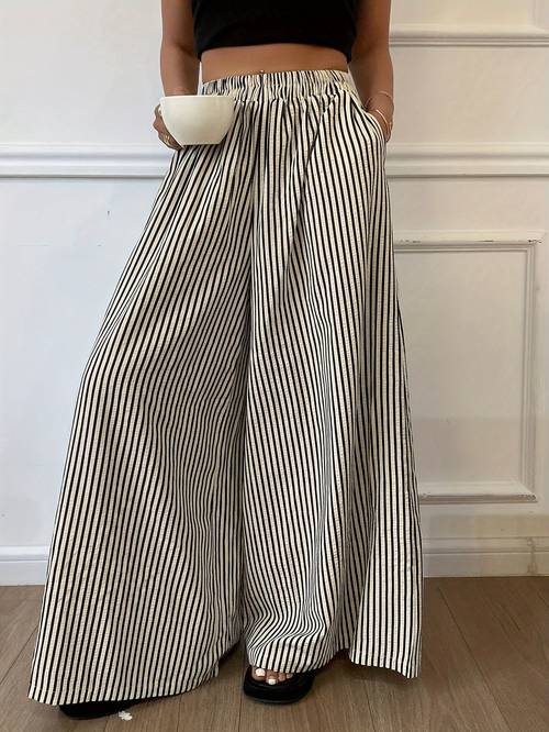 casual womens striped wide leg trousers made of featuring an elastic waistband machine washable fabric vertical stripes and suitable for comfortable wear throughout the year