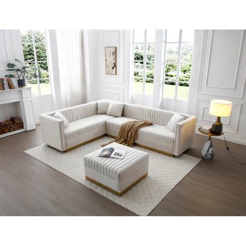 modern sectional sofa with vertical channel tufting in velvet featuring a corner design suitable for living rooms and apartments complete with an ottoman and four pillows in beige