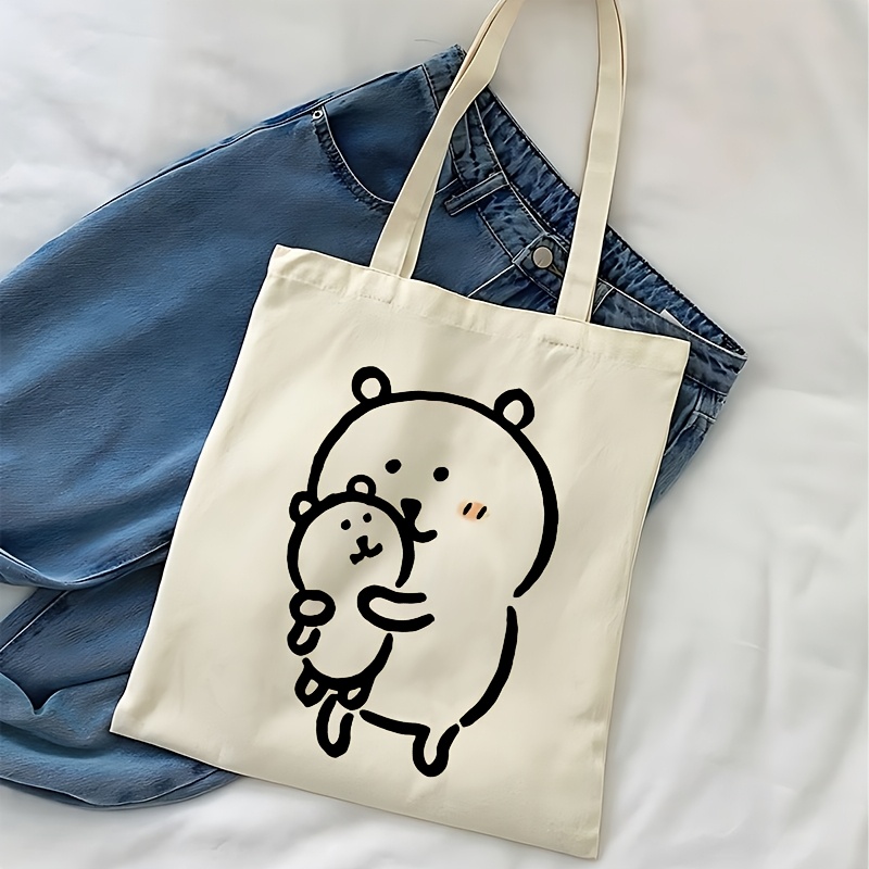 TEMU 【商品名】愛らしいクマの抱き抱きデザインが特徴的な、で再利用可能なキャンバストートバッグ - 丈夫なポリエステルキャンバス製、軽量で大容量なショッピングバッグは、女性、男性、学生、書籍愛好家に最適 - 学校、仕事、旅行に最適