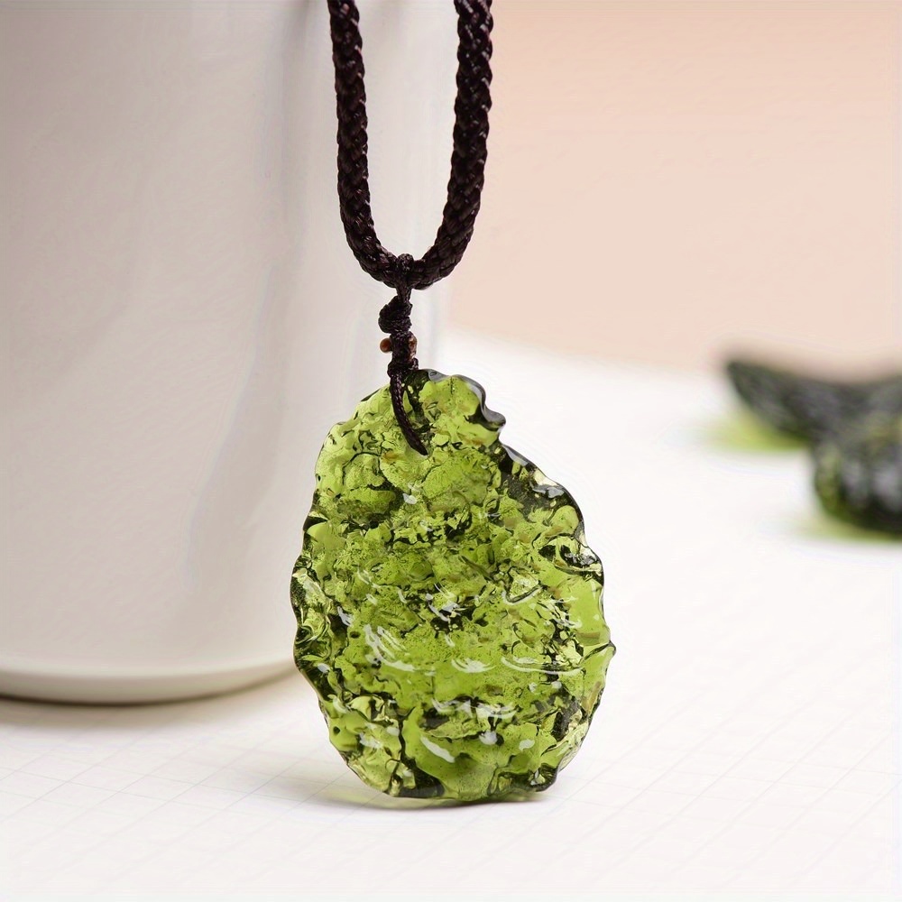 An Irregular Natural Czech Madavorite Meteorite Impact Background With , A Unique Meteorite-shaped Gemstone, A Fashionable Accessory -garde Men And Women