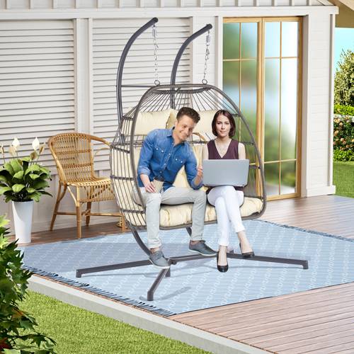 2 person outdoor pe rattan hanging egg chair with beige cushion heavy duty uv rust resistant 480lb capacity hand woven wicker easy assembly for patio deck garden rattan patio furniture garden seating elegant outdoor decor sturdy iron spreaders