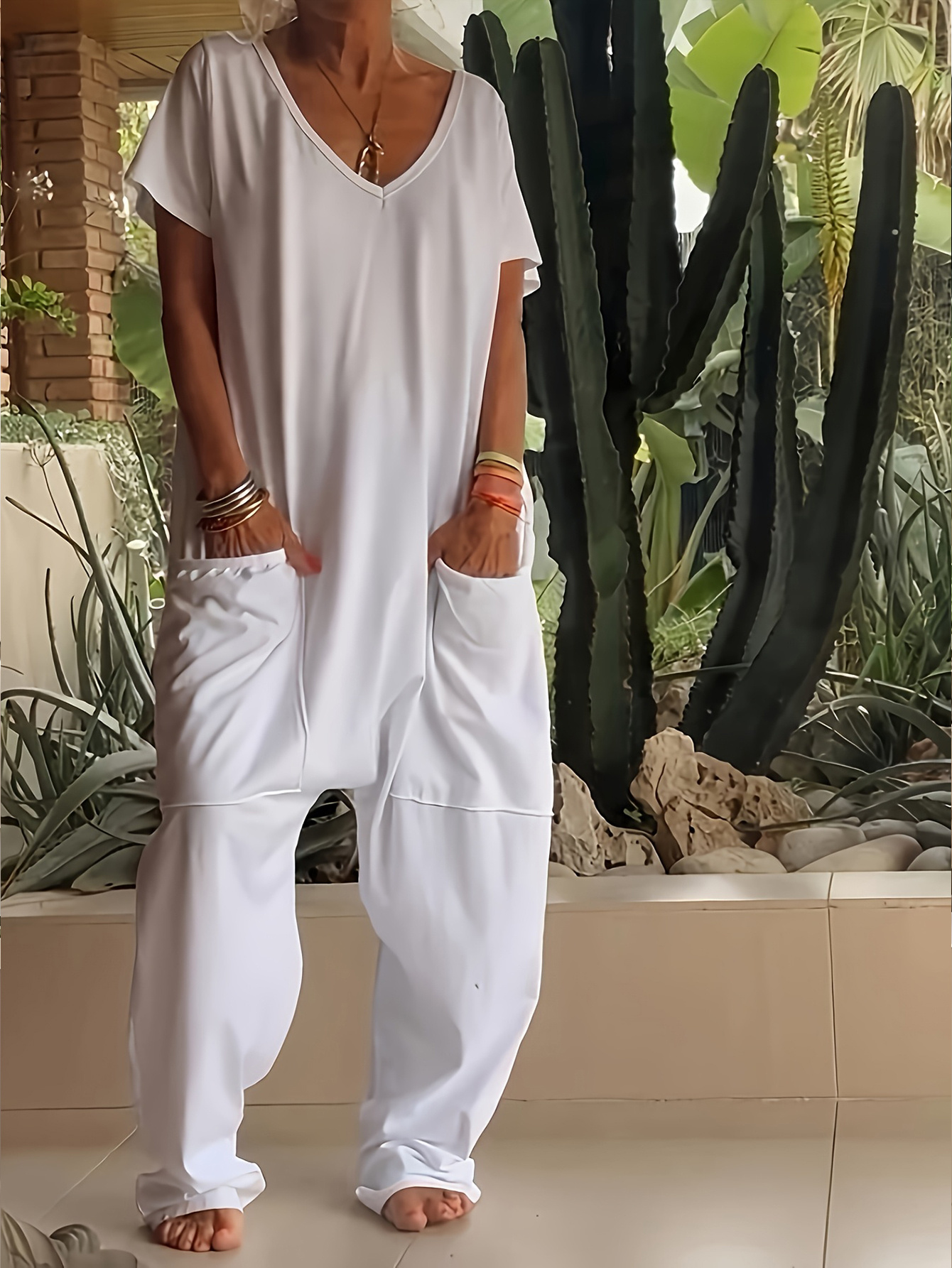 casual loose v neck short sleeve jumpsuit for women in solid color featuring side pockets