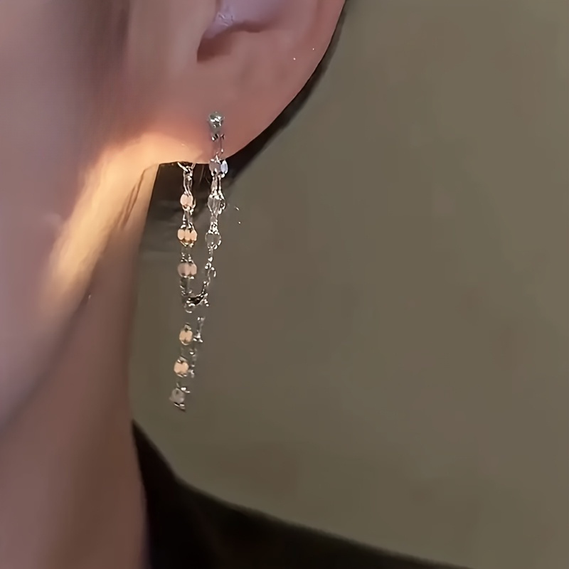 a pair of elegant earrings with double layer chains and tassels suitable for gift   and daily wear classic daily jewelry accessories holiday and birthday gifts anniversary gifts   Product details 2