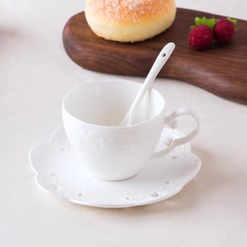 elegant white bone china ceramic cup and saucer set with floral embossing   coffee or tea ideal for home kitchen or breakfast use coffee bar accessories Product details 1