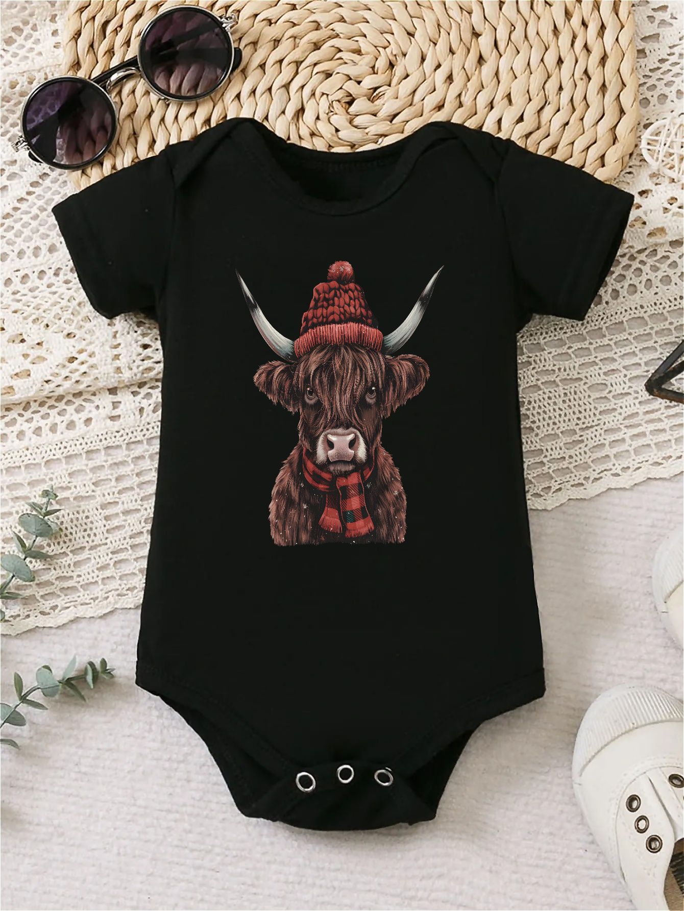 highland cow baby onesie sold on Temu Canada