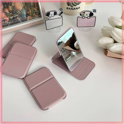 foldable mini hd mirror with adjustable pu stand portable handheld compact suitable for women travel dorm desktop makeup hand washable cosmetic mirror with polished for daily use plastic frame for or the
