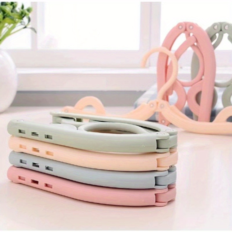 10pcs Set Of Random-colored Foldable Travel Hangers, Featuring A Non-slip Design And Durable Plastic For Easy Portability And Long-lasting Use