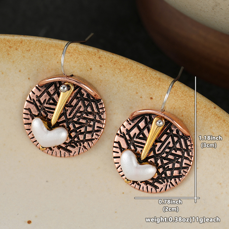 Women's Retro Elegant Heart Dangle Earrings with Artistic Relief Discs
