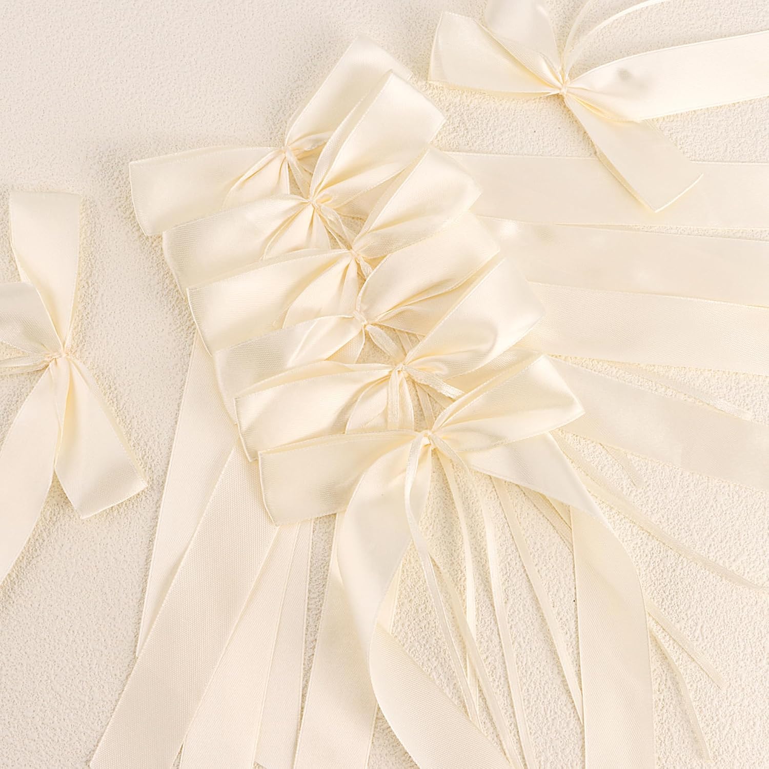 Image of 50pcs Of Handmade Satin Ribbon Bows In Beige For Decorating Cars, Tables, And Rooms For Weddings And Parties