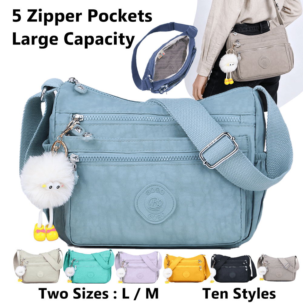 stylish lightweight multi pocket unisex crossbody bag with pendant elegant durable womens shoulder bag sturdy anti theft womens crossbody bag durable fabric multiple compartments adjustable straps perfect for travel daily use commuting Product details 0