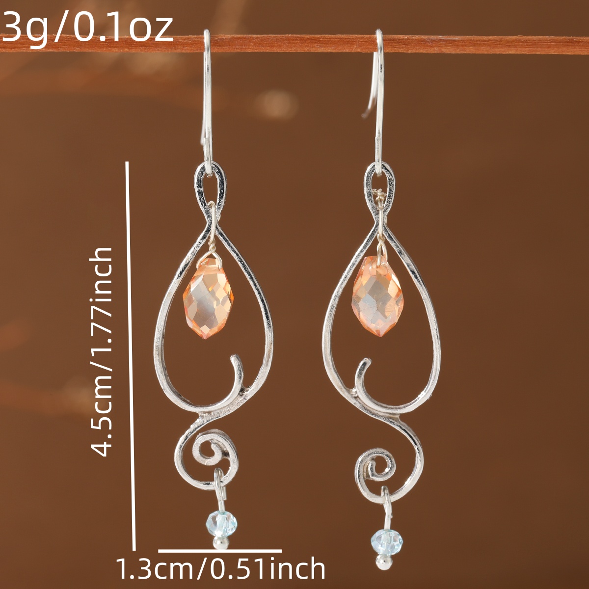 Hollowed-out Teardrop Silhouette Earrings with Synthetic Zirconia