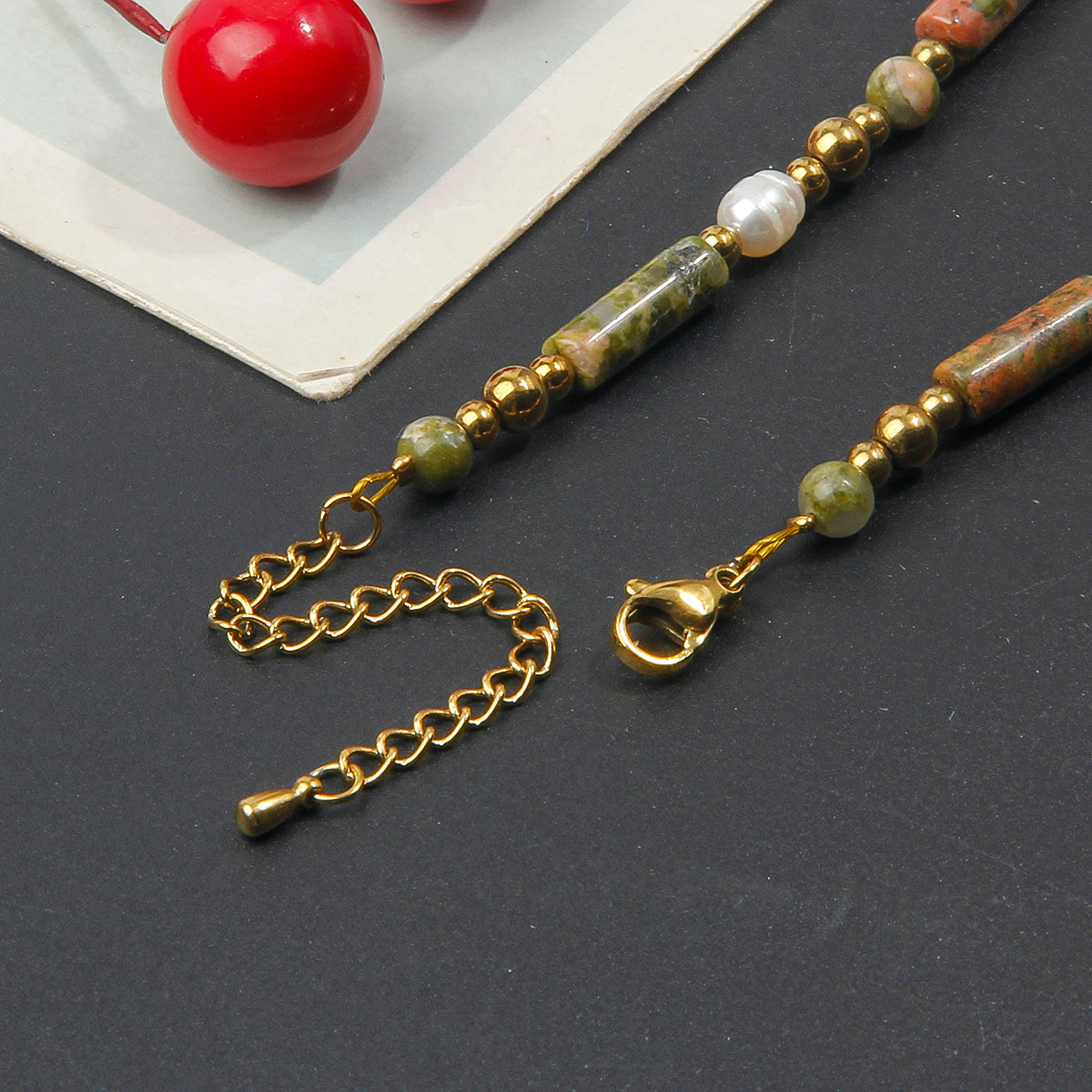 Women's Minimalist Cylinder Bead Necklace with Golden Accents