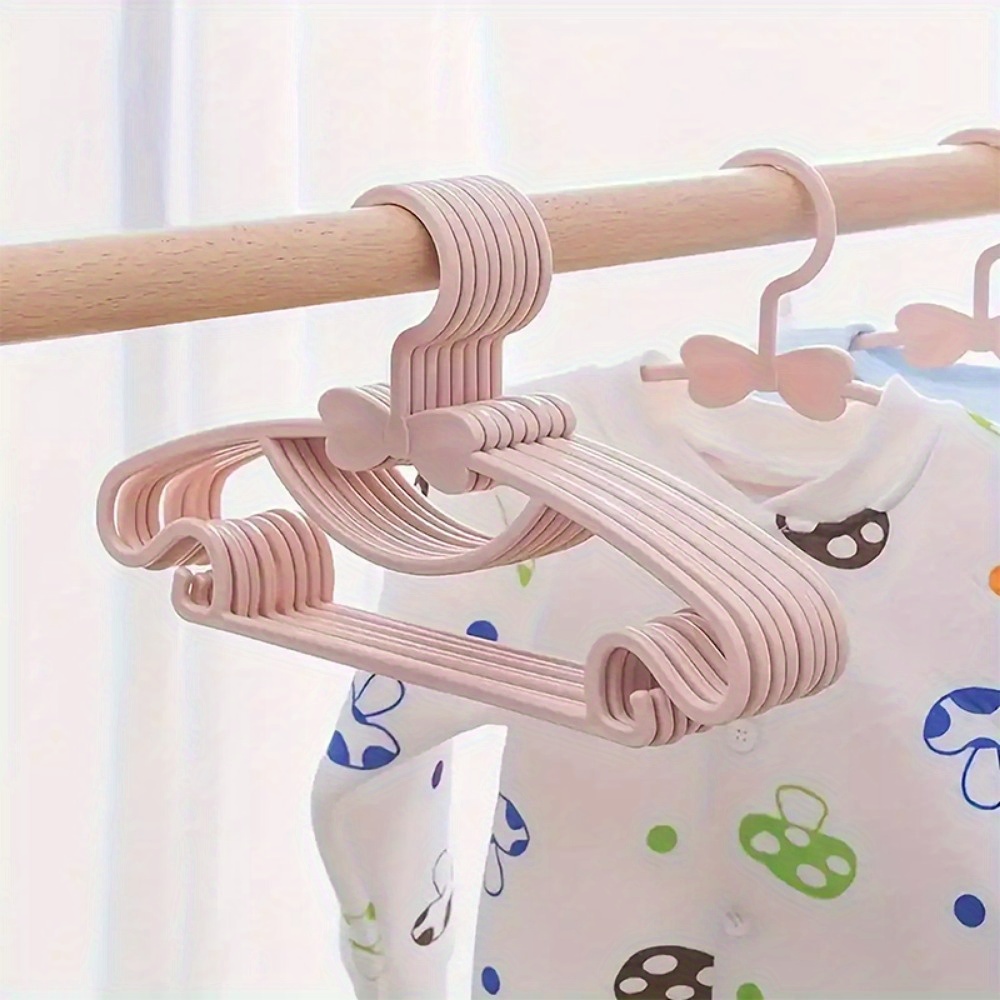 50 stück leichte kunststoff-kleiderbügel für kleidung von jugendlichen, rutschfeste konstruktion,   für hemden, hosen, röcke, jacken von jugendlichen, flache platzsparende struktur, ideal für schlafzimmer, waschküche, organisation von kleiderschränken für kleinkinder, tägliche aufbewahrung von kleidung für jugendliche