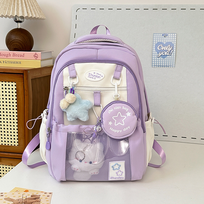 stylish nylon backpack with cute bunny charms lightweight design adjustable straps front mesh pocket happy little blue yellow black school or casual use everyday bag stylish backpack backpack for travel details 1