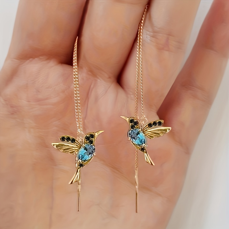 E-shop Ein Paar elegante und kreative lange Ohrringe für Damen, mit blauem synthetischem Zirkonia und einem Kolibri-Design, für Freizeitaktivitäten,