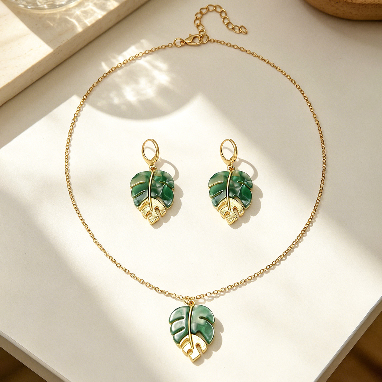 TEMU Juego de 2 piezas de estilo bohemio con aretes y collar de forma irregular de hoja, que desprenden un encanto elegante. Adecuado para atuendos