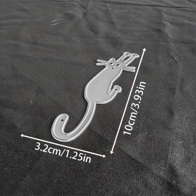 Image of A Metal Cutting Die In Of A Cat, Silver-gray, With A Fantasy Theme, Suitable For Scrapbooking, Embossing, Handmade Card Making, And Gift Card Creation