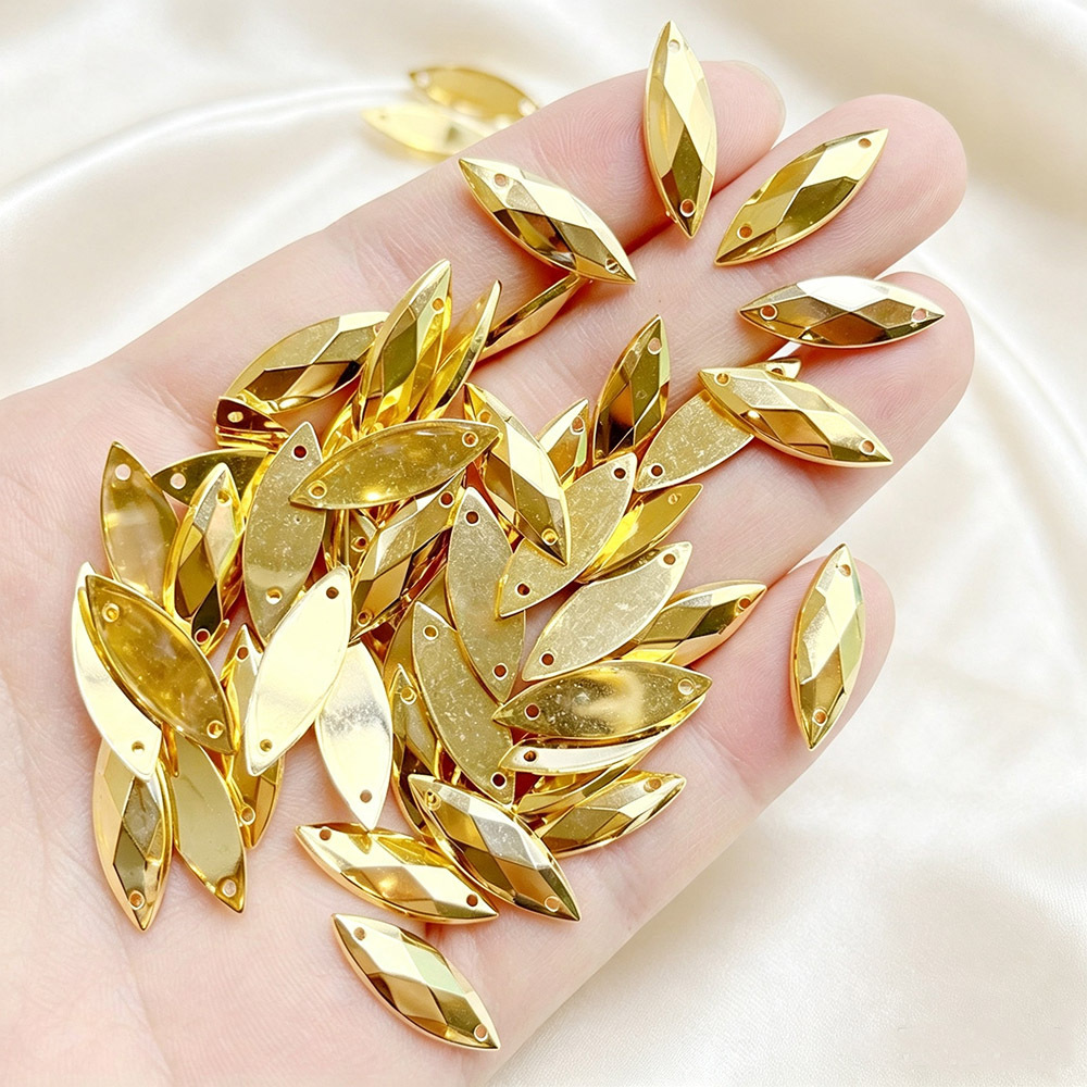 TEMU 66pcs 0.7 X 2.1cm Golden Marquise Acrylic Sew-on Rhinestones, Flat Back 2 Holes Shape Acrylic Gems, Loose Sewable Rhinestones For Clothing Dress
