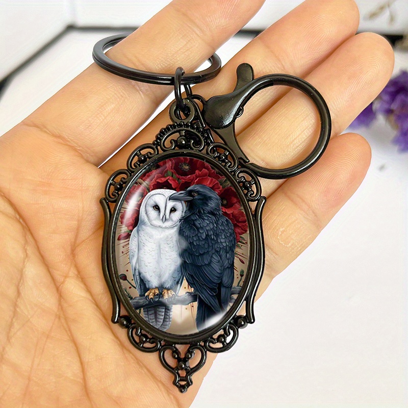 TEMU A Stylish Gift Accessory Featuring A Dark-themed Design Of An Owl And A Crow With Poppy Flowers On An Oval Black Keychain For And Backpacks