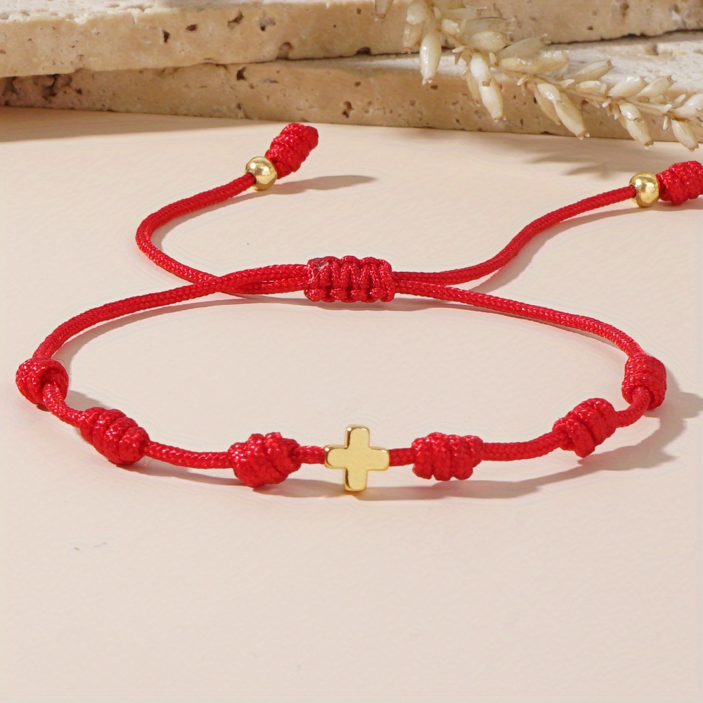 Image of A Bohemian Minimalist Style Women's Fashion Bracelet Featuring 4mm Vacuum- Copper Beads, A Cross, And A Peruvian Knot With An Adjustable Red String, Perfect As A Gift For Everyday Occasions.