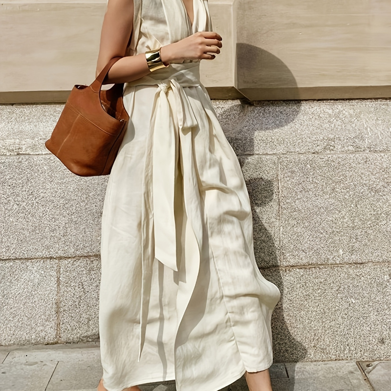 

Solid Color Spring And Summer Sleeveless Dress With Pockets, Belt, And An Elegant French Style, Vacations.