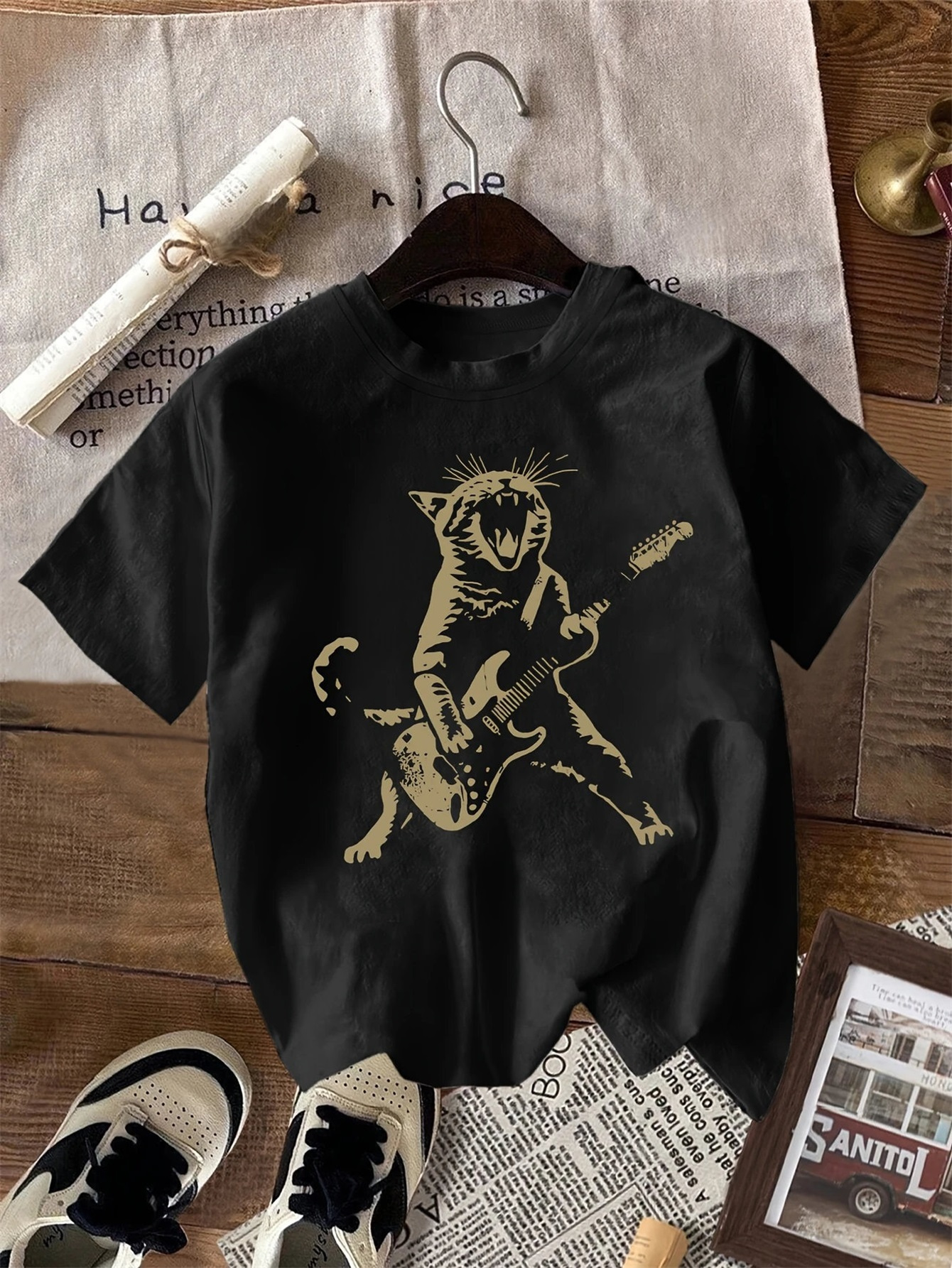 black cat shirt sold on Temu Canada