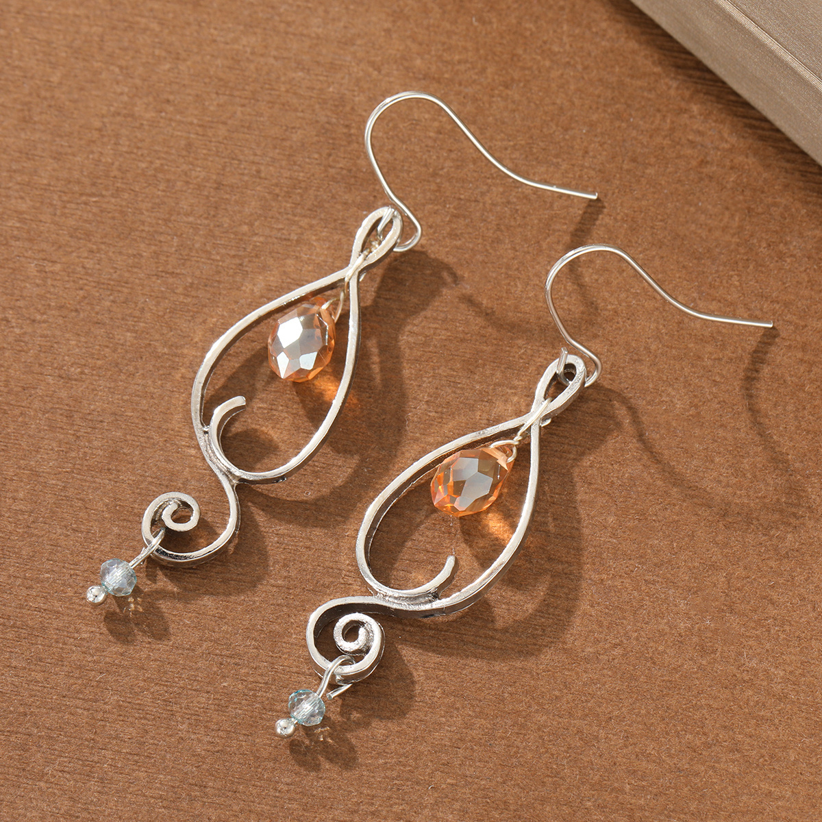 Hollowed-out Teardrop Silhouette Earrings with Synthetic Zirconia