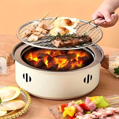 portable mini tabletop grill made of stainless steel with a grill net designed for home use used as a split charcoal grill
