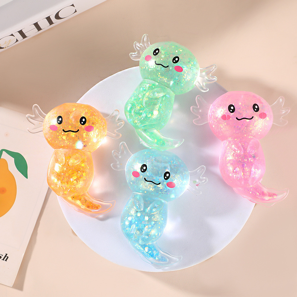 two sets of random round mouth salamander shaped squeezing toys decorated with glitter featuring slow rebound and stress relieving sensory relaxation functions suitable as souvenirs for solo   table decorations and squeezing toy gifts