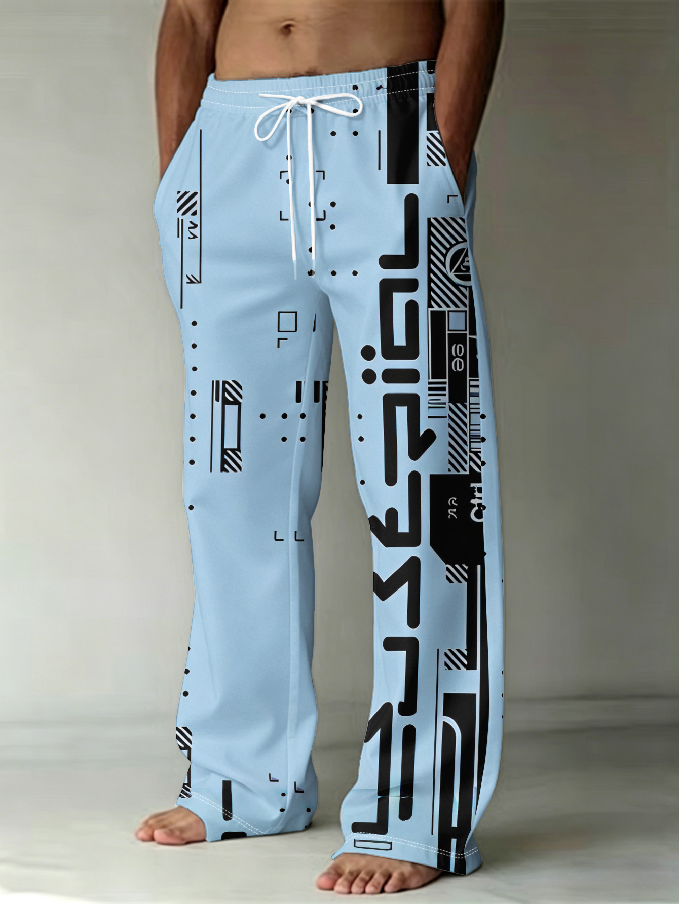printed design not textured fashionable printed mens trousers featuring   design pattern with geometric elements as   color scheme   straight leg pants come with pockets and a drawstring   a trendy european