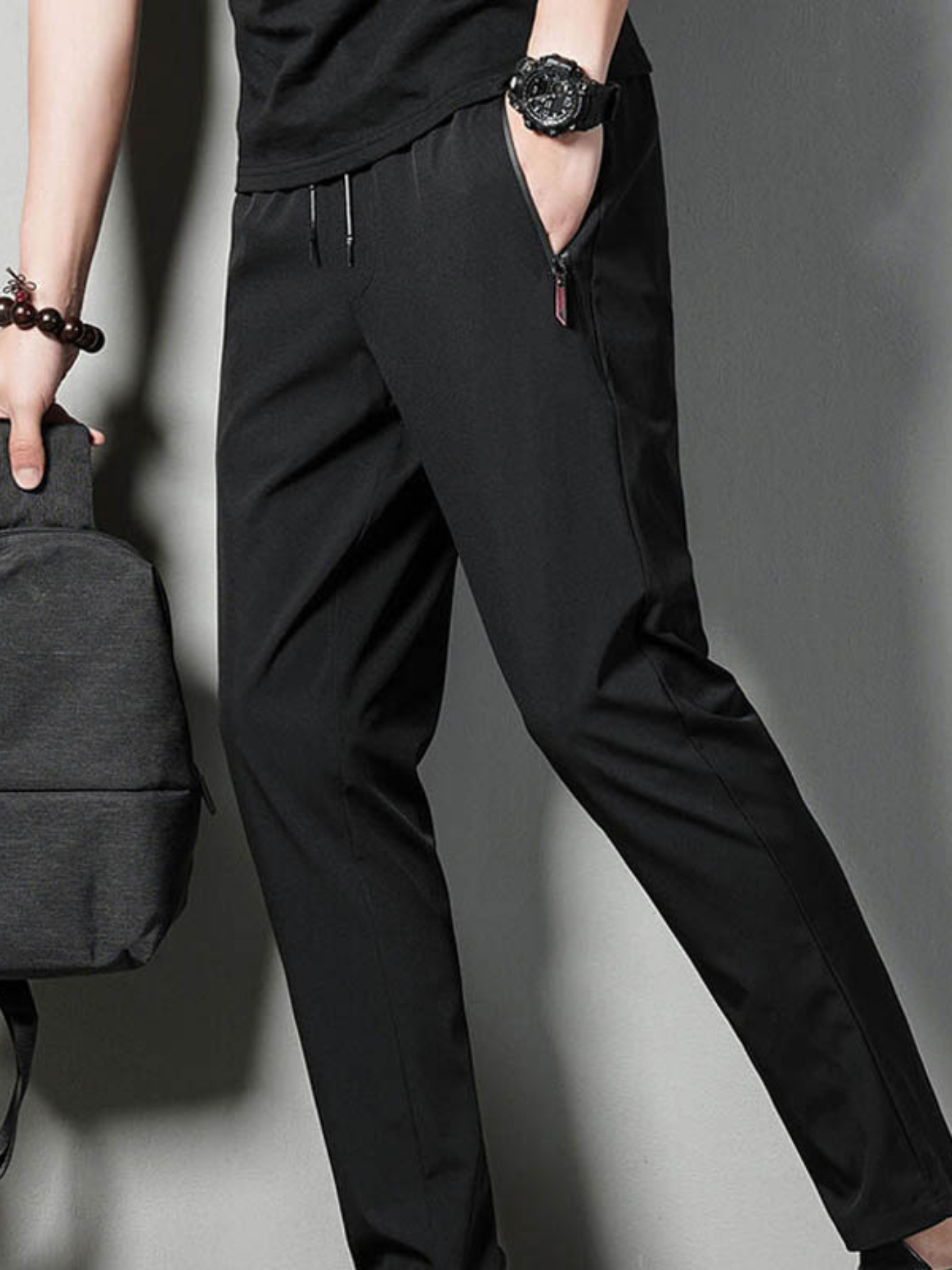 lightweight and quick drying mens trousers pleated straight   simple and versatile fabric   and comfortable   cut is fashionable and stylish zipper   convenient and practical suitable for leisure and sports in many scenes multiple colors are   to show personality easy to match to create a   of styles black 1