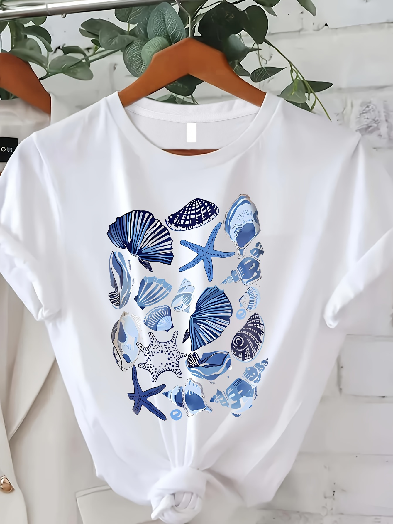 ladies white shirt sold on Temu United States