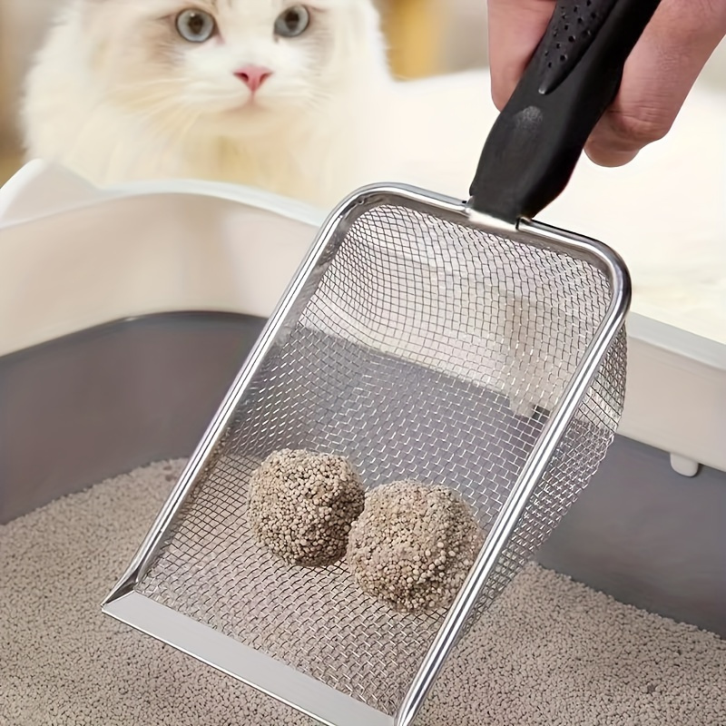 Une pelle à litière pour chat en acier inoxydable, facile à nettoyer et durable, parfaite pour nettoyer les déchets de chat et adaptée à la litière fine