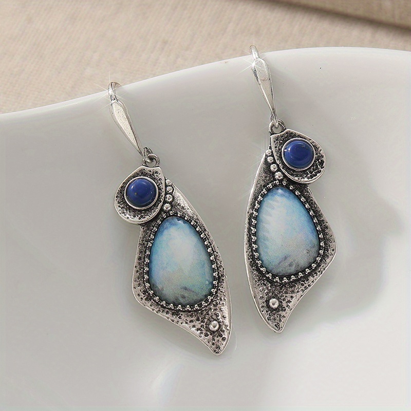 Image of Retro Style Bronze Carved Earrings | Bohemian Style Irregular Hanging Design Hand-carved Women's Earrings Halloween Accessories Holiday Gift Essentials For Her