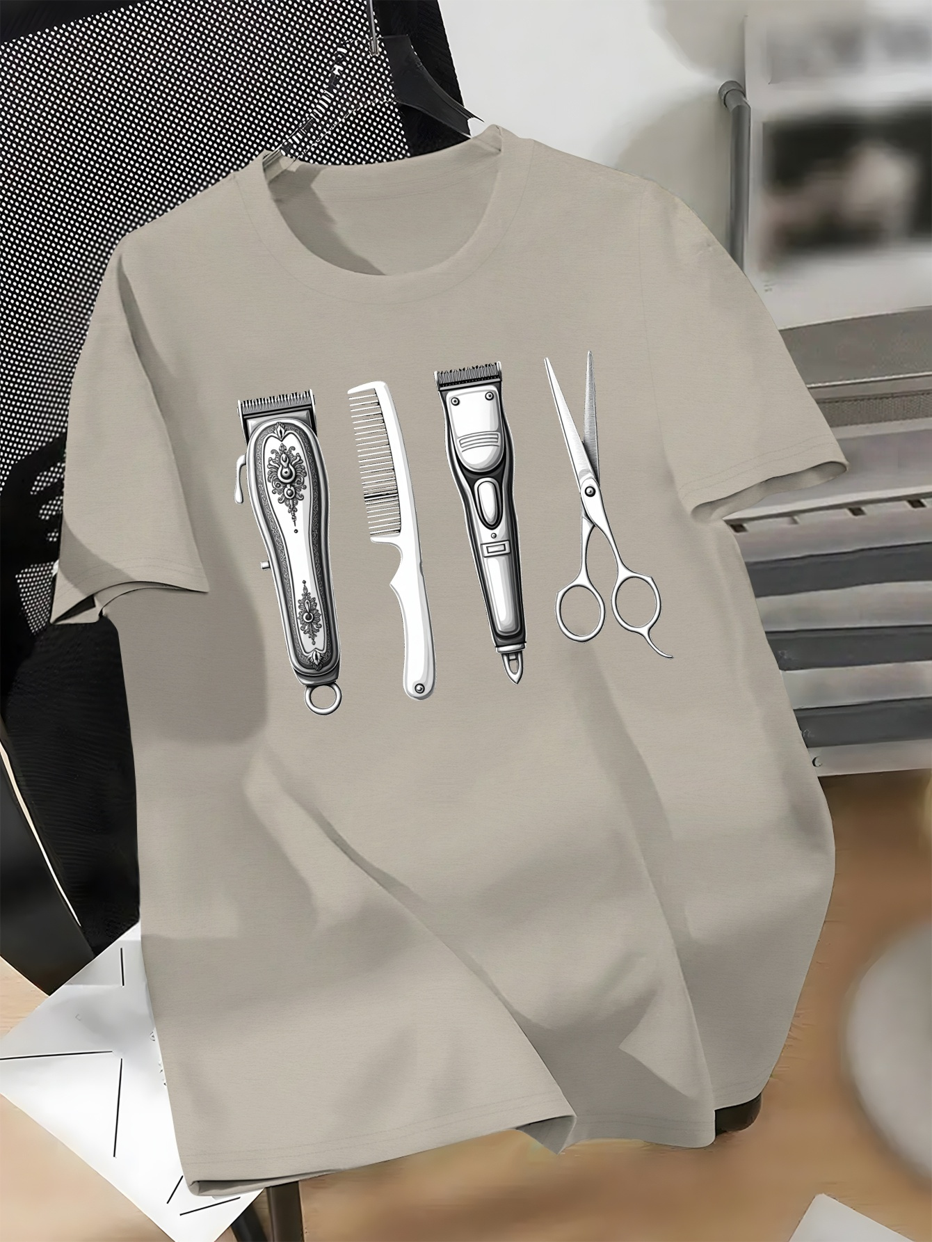 Monochrome Artwork of Traditional Barber Tools on a T-Shirt,   Men, Ideal for Casual Summer Wear with Short Sleeves.
