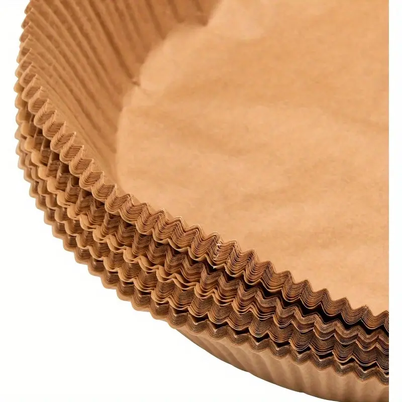 100-pack of round baking liners made from , greaseproof silicone paper, suitable for cakes and pies, as air fryer liners., used as covers, oven cups, roasting folds, meat, vegetable, and fruit preparation, paper pans for an ideal gift item., hanging cart application, baking trays. kitchen cooking, waterproof and disposable, vacuum trays. Product details 5