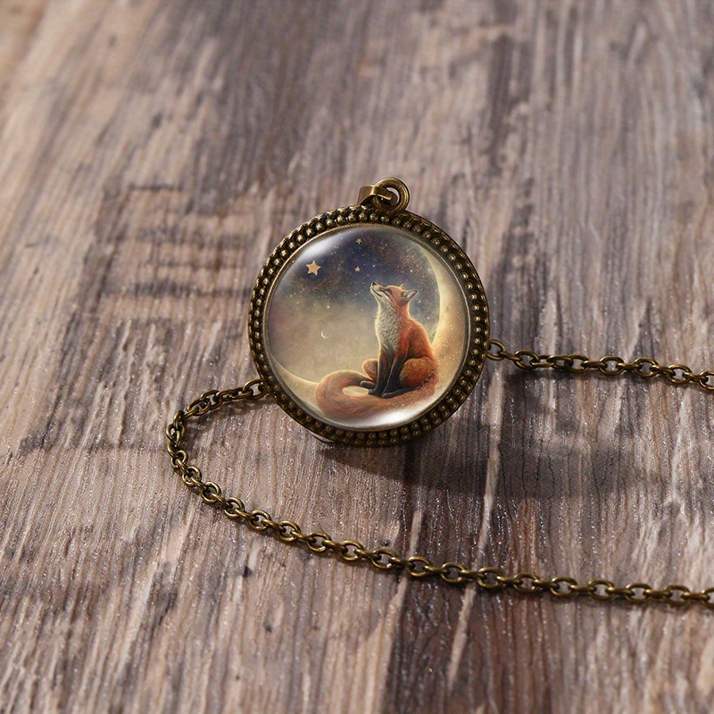 A Handmade Glass Pendant Featuring A 25mm Round Lace Design With A Crescent And Fox