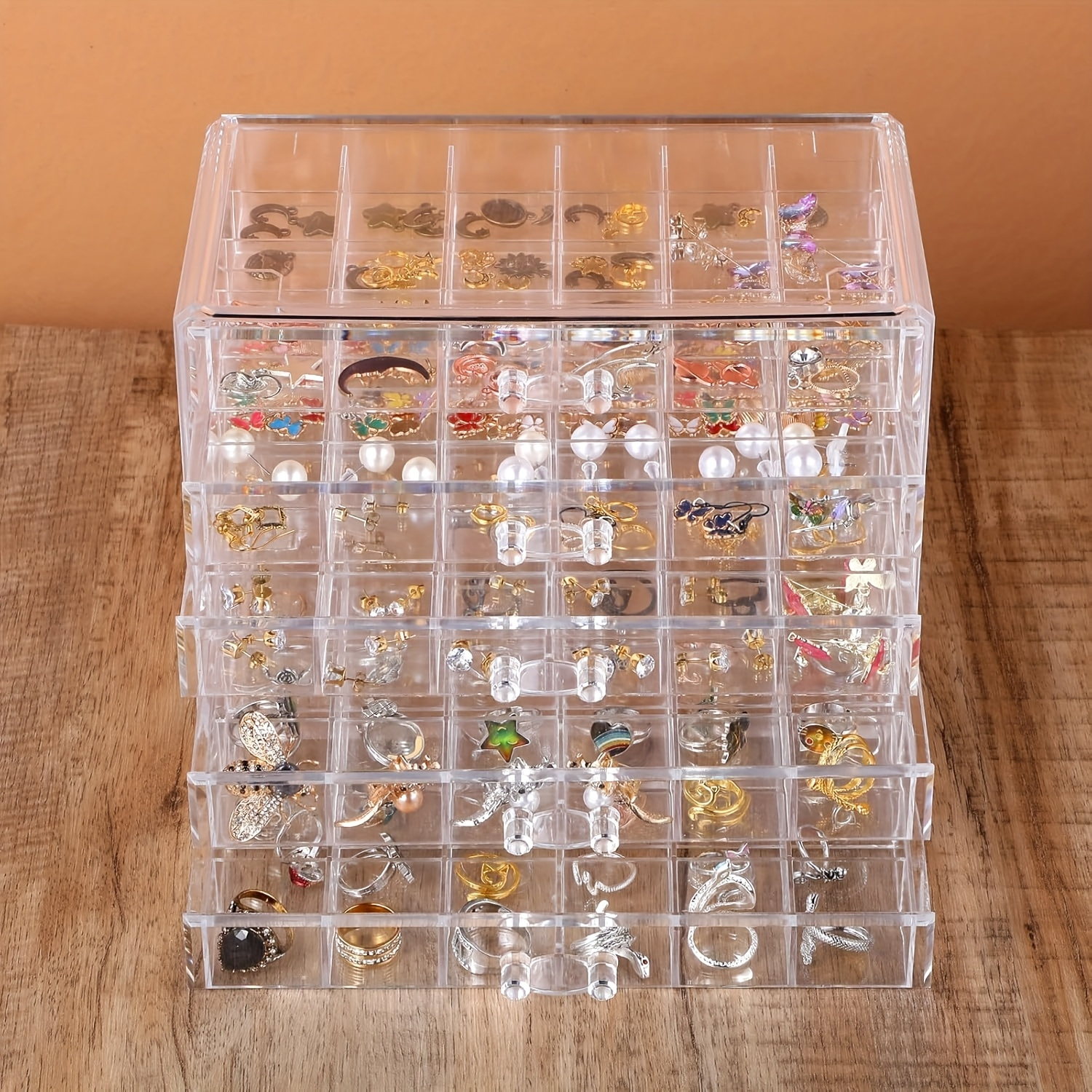 jewelry storage box with 5 drawers featuring 5 layers and 120 compartments made of transparent plastic this multifunctional and minimalist organizer is suitable for women and girls serving as a clear display stand for earrings necklaces rings and bracelets it can     great gift for   and mothers Product details 2