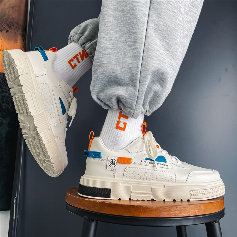 mens stylish white sneakers orange accents versatile low top