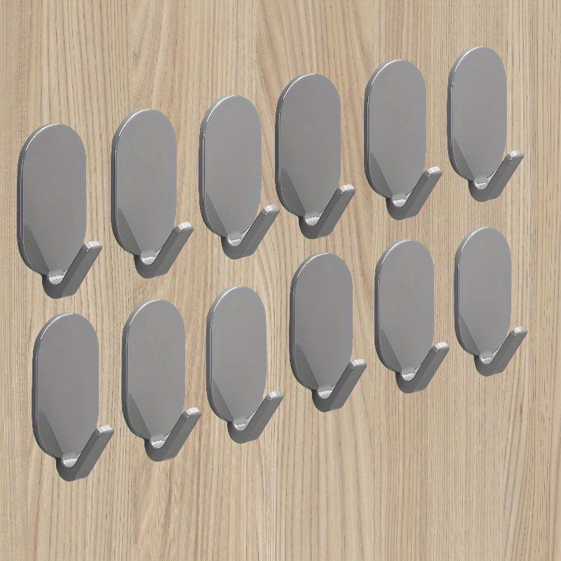 TEMU 6/12 ganci adesivi resistenti - Nessuna perforazione richiesta, per bagni e WC, appendini multifunzionali a parete, appendini moderni a parete,
