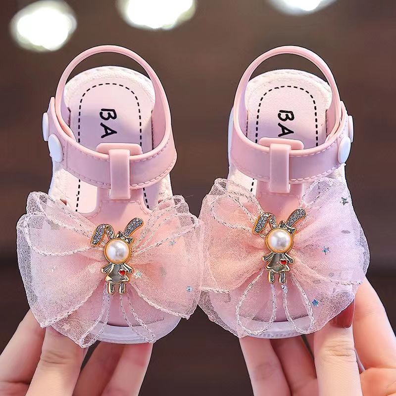 f5562eaf438443d2b828adf887f50616-goods.jpeg 2025 Spring Summer Girls' Low-Top Princess Sandals with Adjustable Hook-and-Loop Closure, Soft PVC Sole & Sparkling Bow Accents
