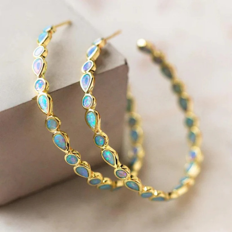 Image of Elegant Teardrop-shaped Hoop Earrings With A Shimmering End, Perfect For Women And Suitable For Everyday Wear Or Special Occasions