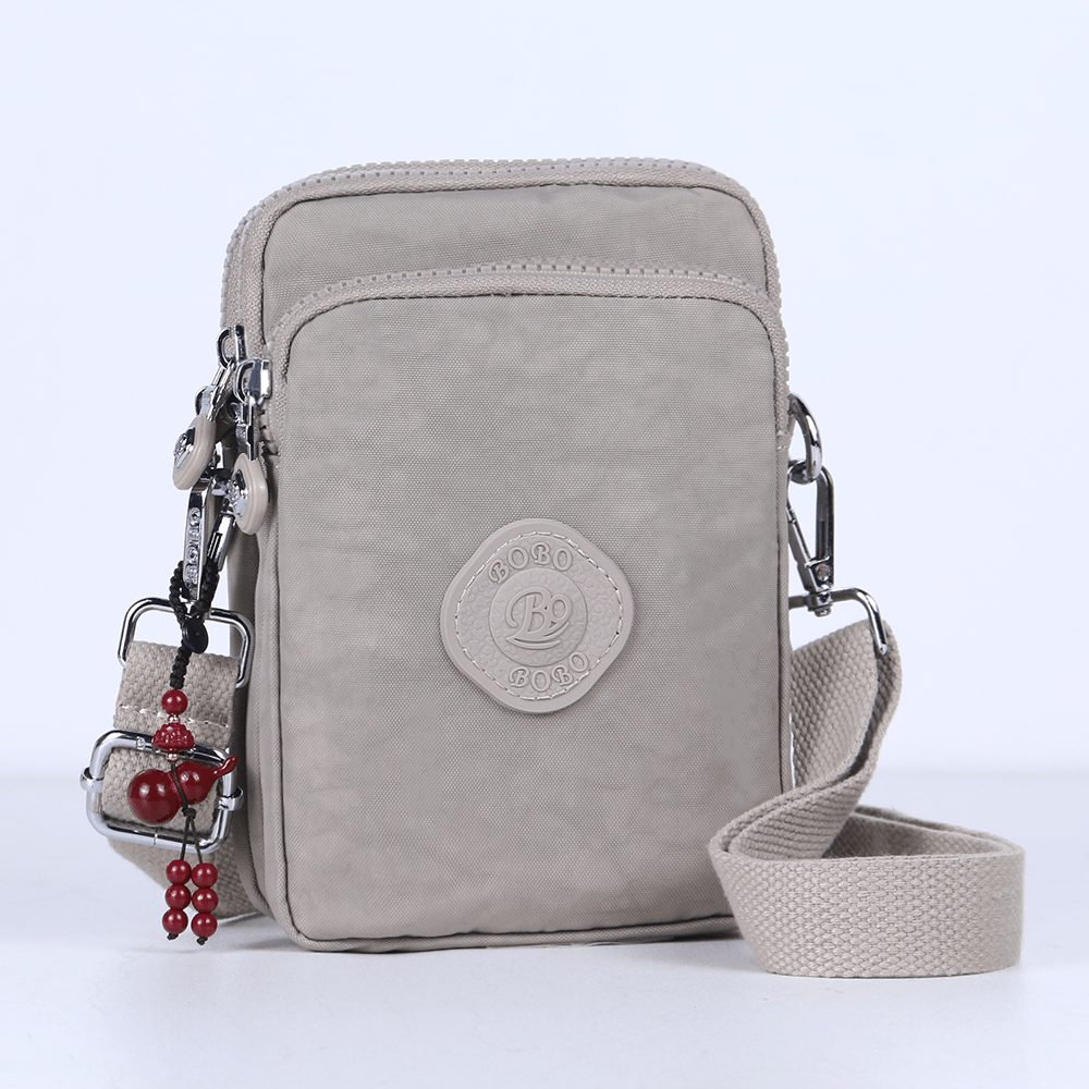 TEMU Chic Lightweight Versatile Nylon Unisex Crossbody Bag With Pendant, High Quality Durable Stylish Mini Women's Shoulder Bag, Multi-pocket Unisex