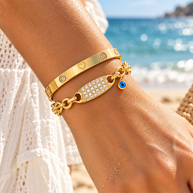 Heart Embossed Gloss Open Bangle & Evil Eye Charm Bracelet Set