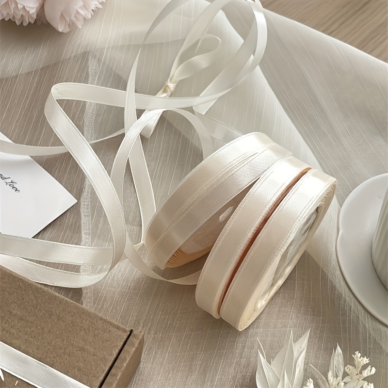 Image of 4 Rolls Of 22 Meters Each Of Cream Yellow Satin Ribbon Suitable For Gift Wrapping, Premium Cord Ideal For Hair Braiding