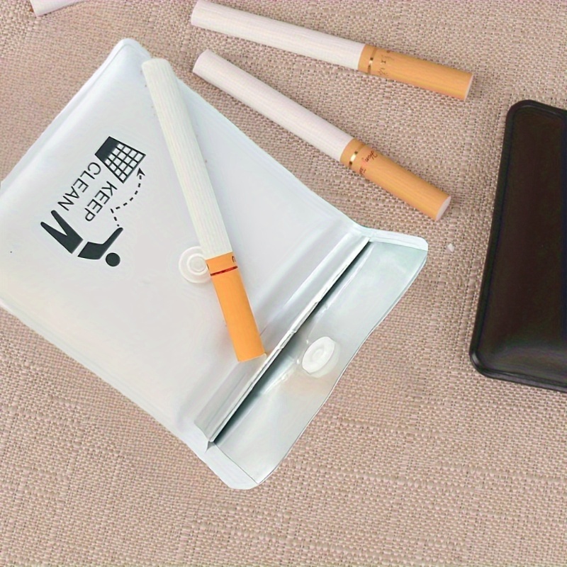 cigarette mountain Pile of smoked used cigarettes in an ashtray. Mountain of cigarettes and  copy space Stock Photo