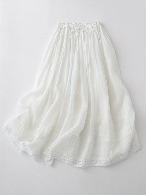 long skirt with a solid color and lace in a bohemian style featuring a loose fit and an elastic waistband with a hem vacations