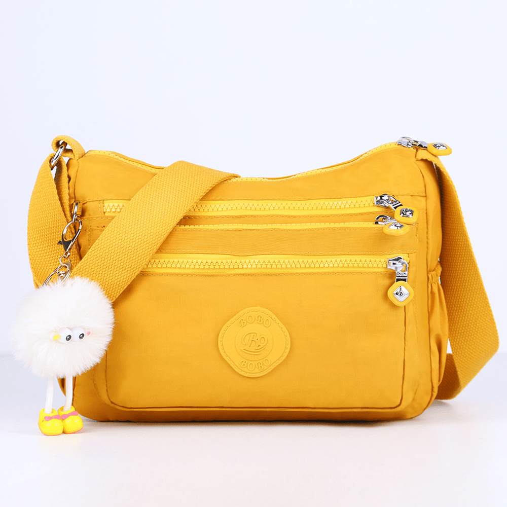 stylish lightweight multi pocket unisex crossbody bag with pendant elegant durable womens shoulder bag sturdy anti theft womens crossbody bag durable fabric multiple compartments adjustable straps perfect for travel daily use commuting Product details 21