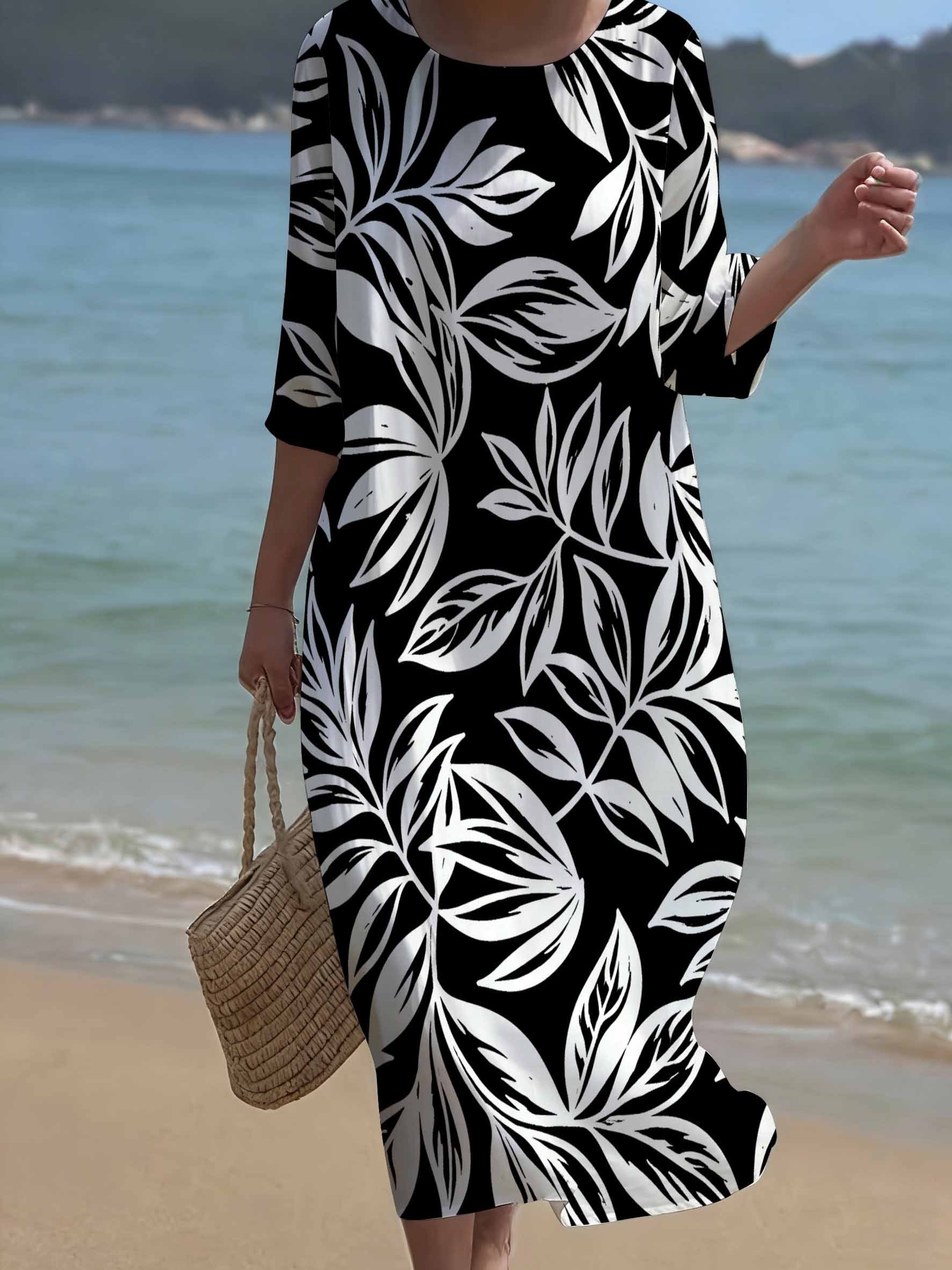 plus size plus size a loose fitting long sleeved dress for plus size women featuring a tropical leaf design showcasing a minimalist modern aesthetic this   dress has a round neckline